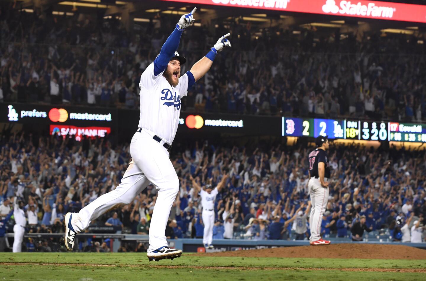 Dodgers Max Muncy hits the game-winning home run against the Red Sox in the bottom of the 18th inning.