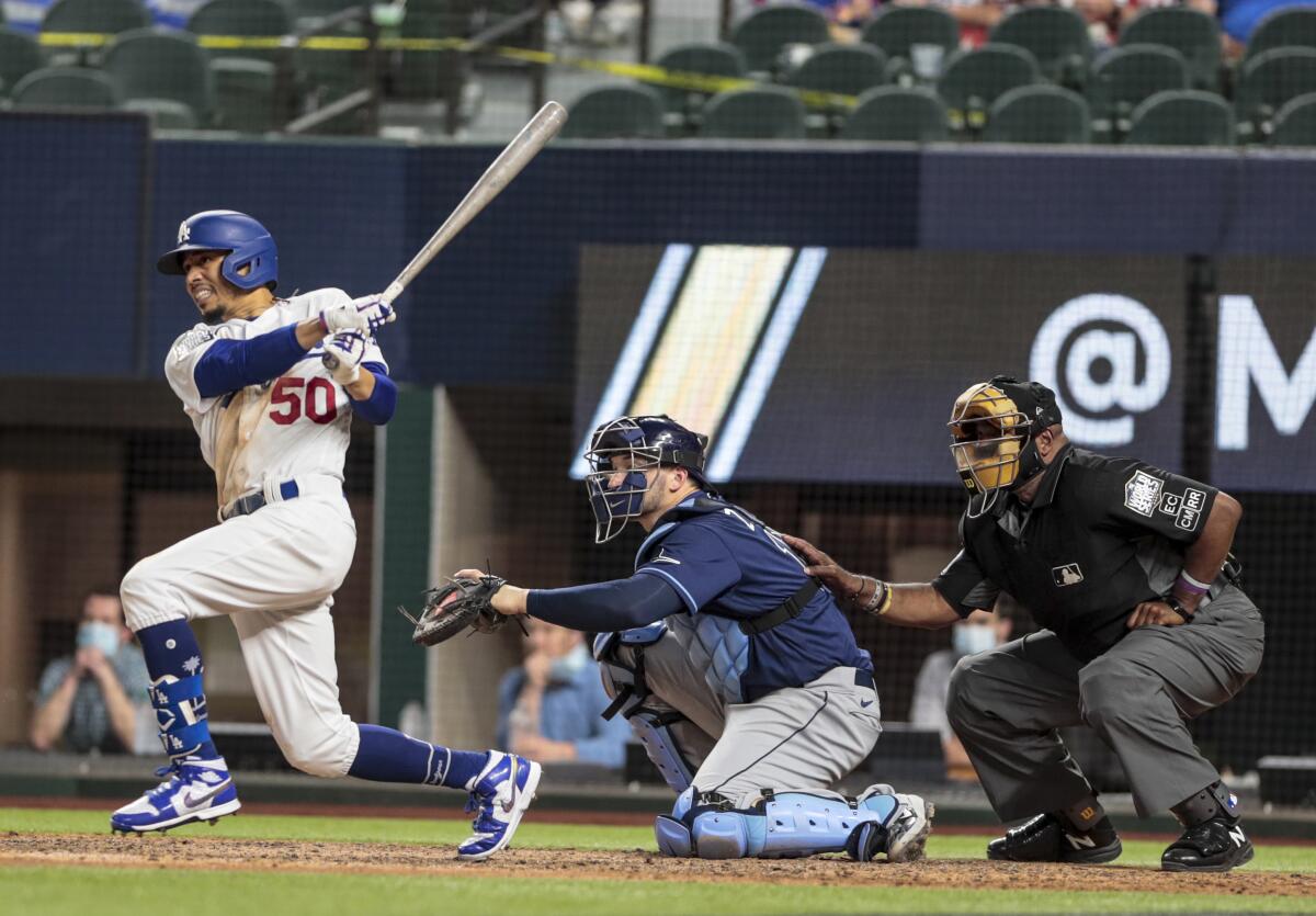 The Dodgers' Mookie Betts bats during the 2020 World Series.
