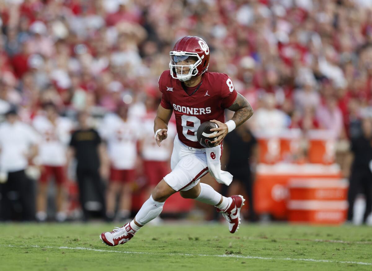 Oklahoma quarterback Dillon Gabriel runs for a touchdown against Iowa State on Sept. 30.