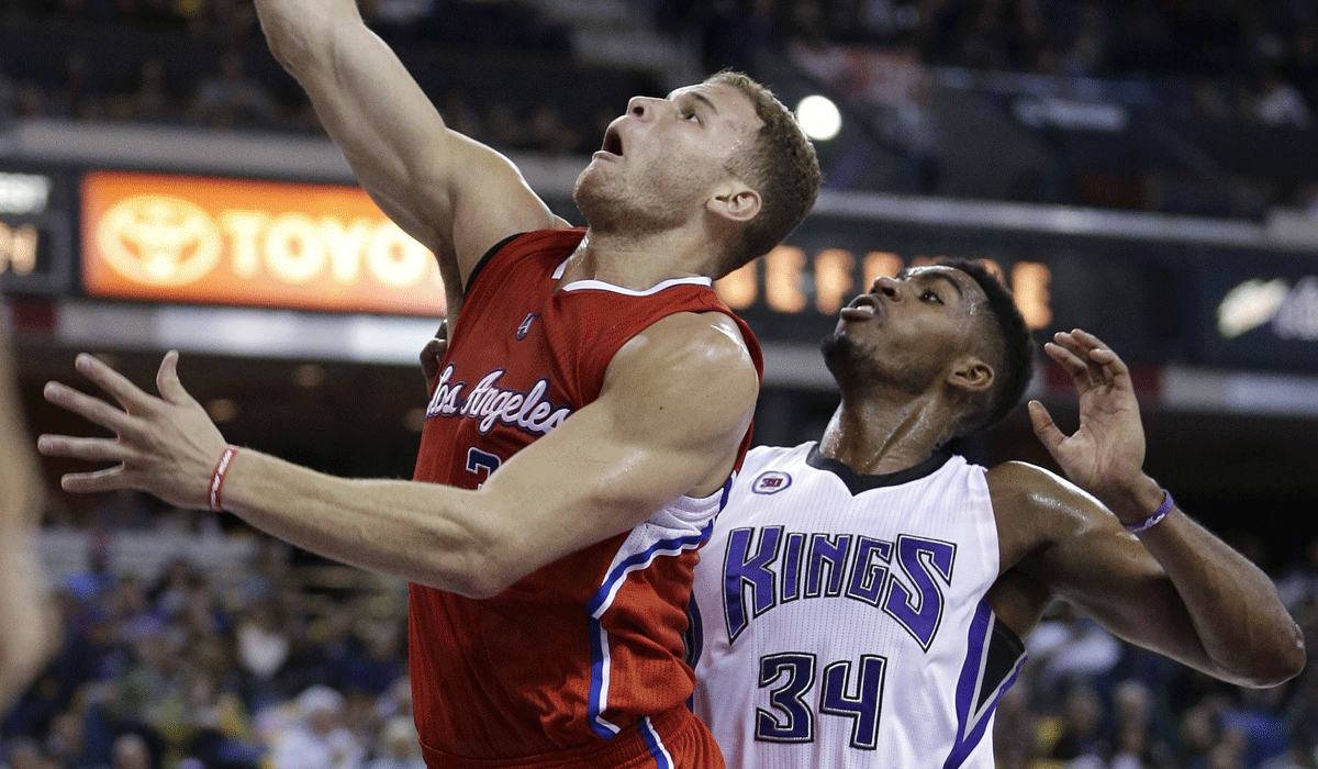 Blake Griffin goes to the basket against Sacramento Jason Thompson during the Clippers' 117-108 victory on Saturday.