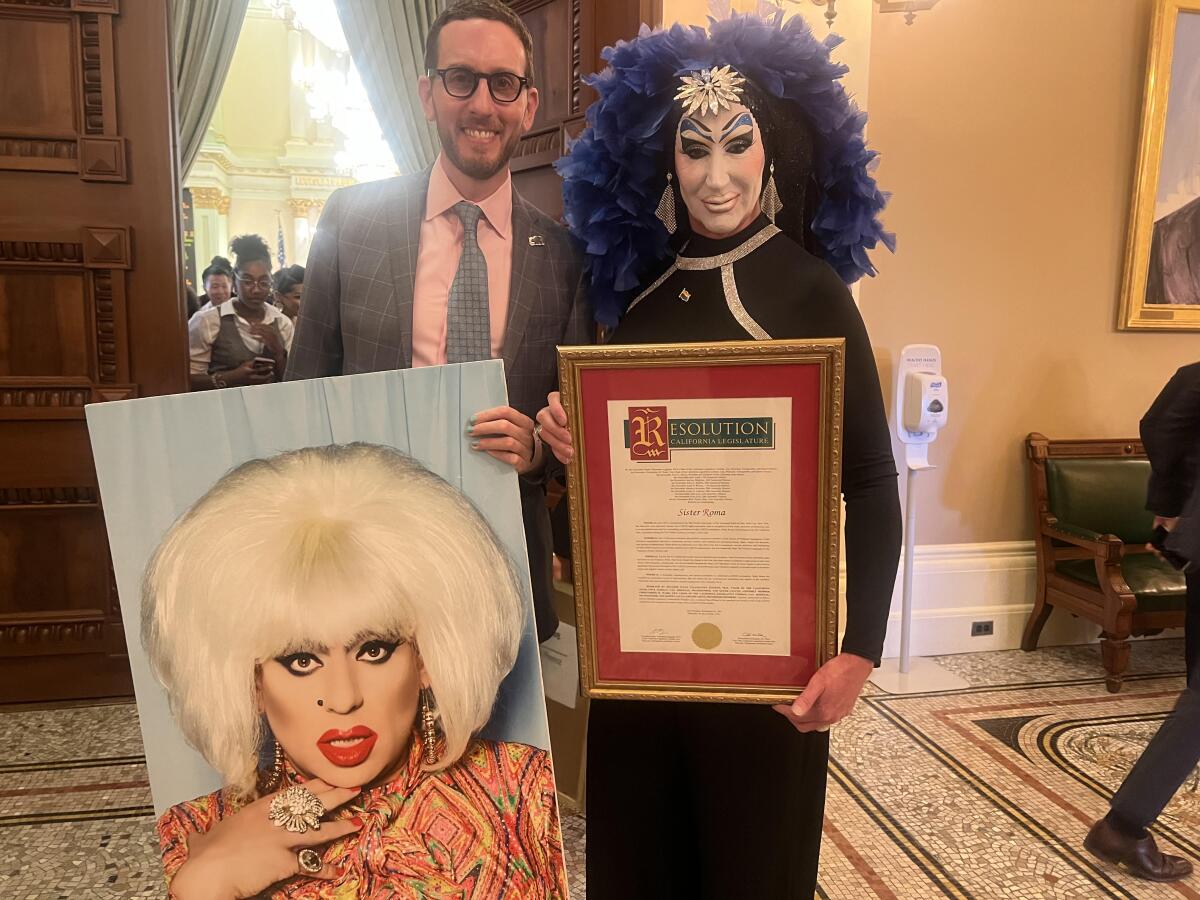 State Sen. Scott Wiener (D-San Francisco) with Sister Roma in the state Capitol. 