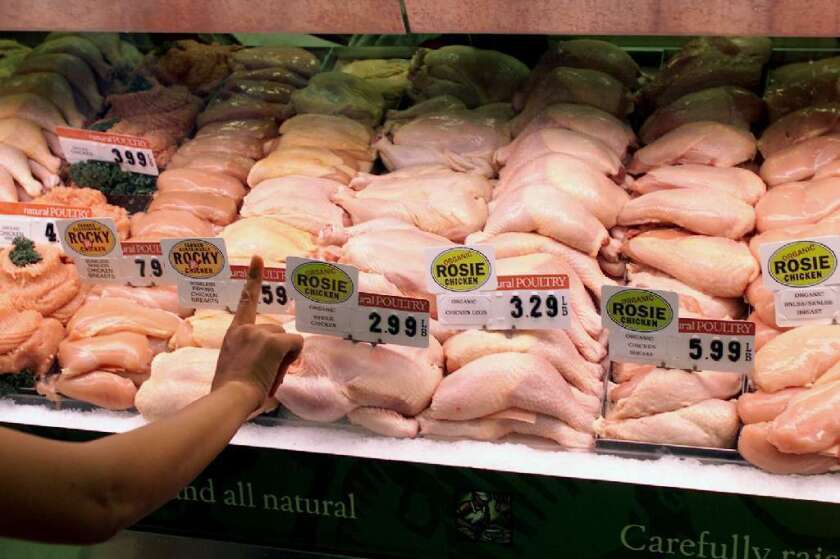 Chicken on display at a grocery store in 2002.