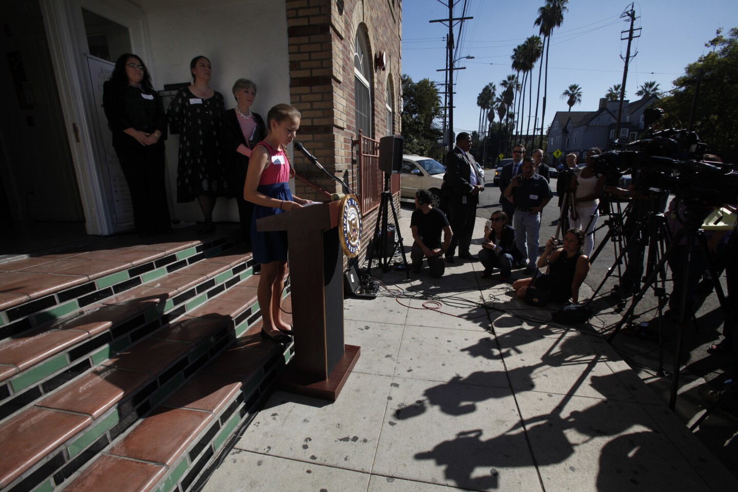 Nalleli Cobo, 13, speaks to the news media during a press conference in her University Park neighborhood in Los Angeles. Nalleli narrated a video produced by local activists asking that the Allenco oil field not resume operations.