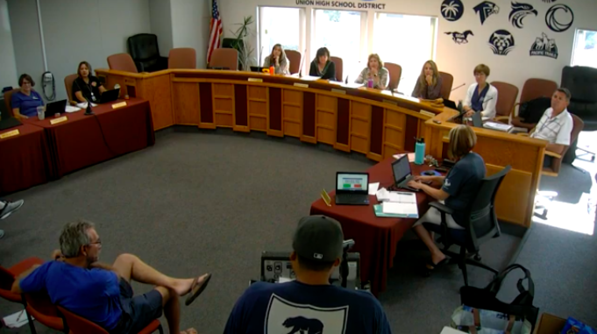 Classified employee Carlos Magana addresses the board on Aug. 22.