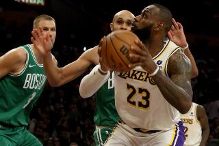 Los Angeles, CA - Lakers forward LeBron James goes to the basket against the Celtics.