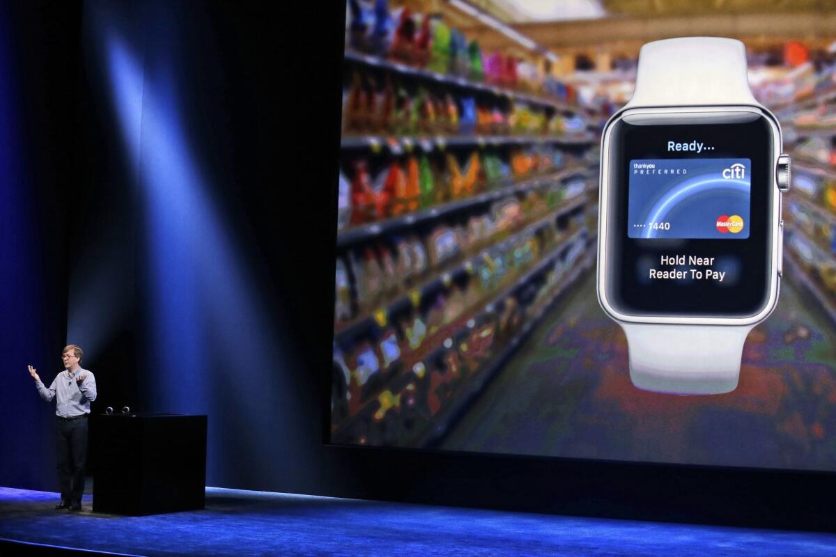 Apple's Kevin Lynch discusses the Apple Pay feature of the new Apple Watch in March.