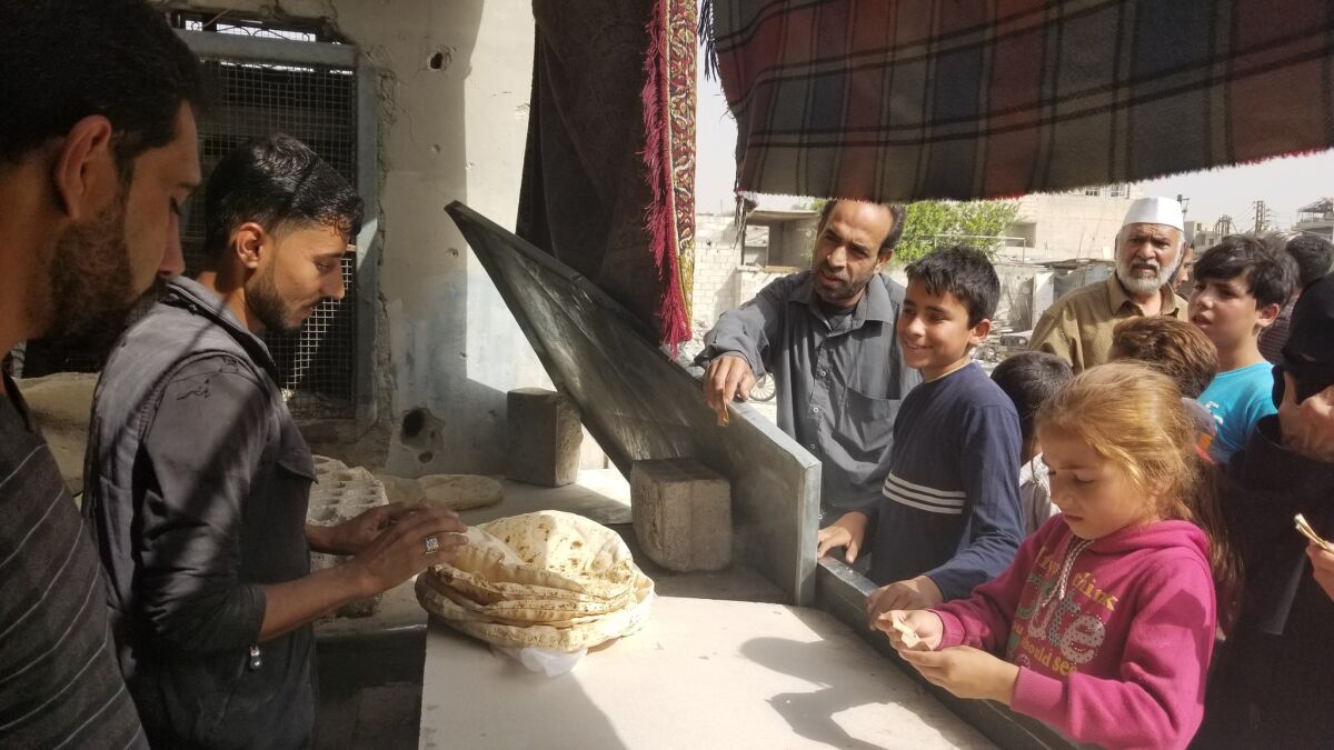 The Syrian government has set up a number of mobile bakeries to provide bread for Duma residents.