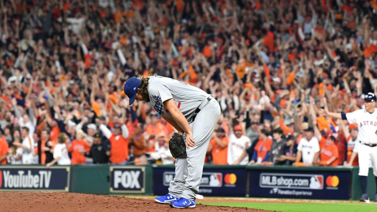 Clayton Kershaw reacts after giving up a three-run home run to the Astros' Yuli Gurriel during Game 5 of the 2017 World Series at Minute Maid Park.