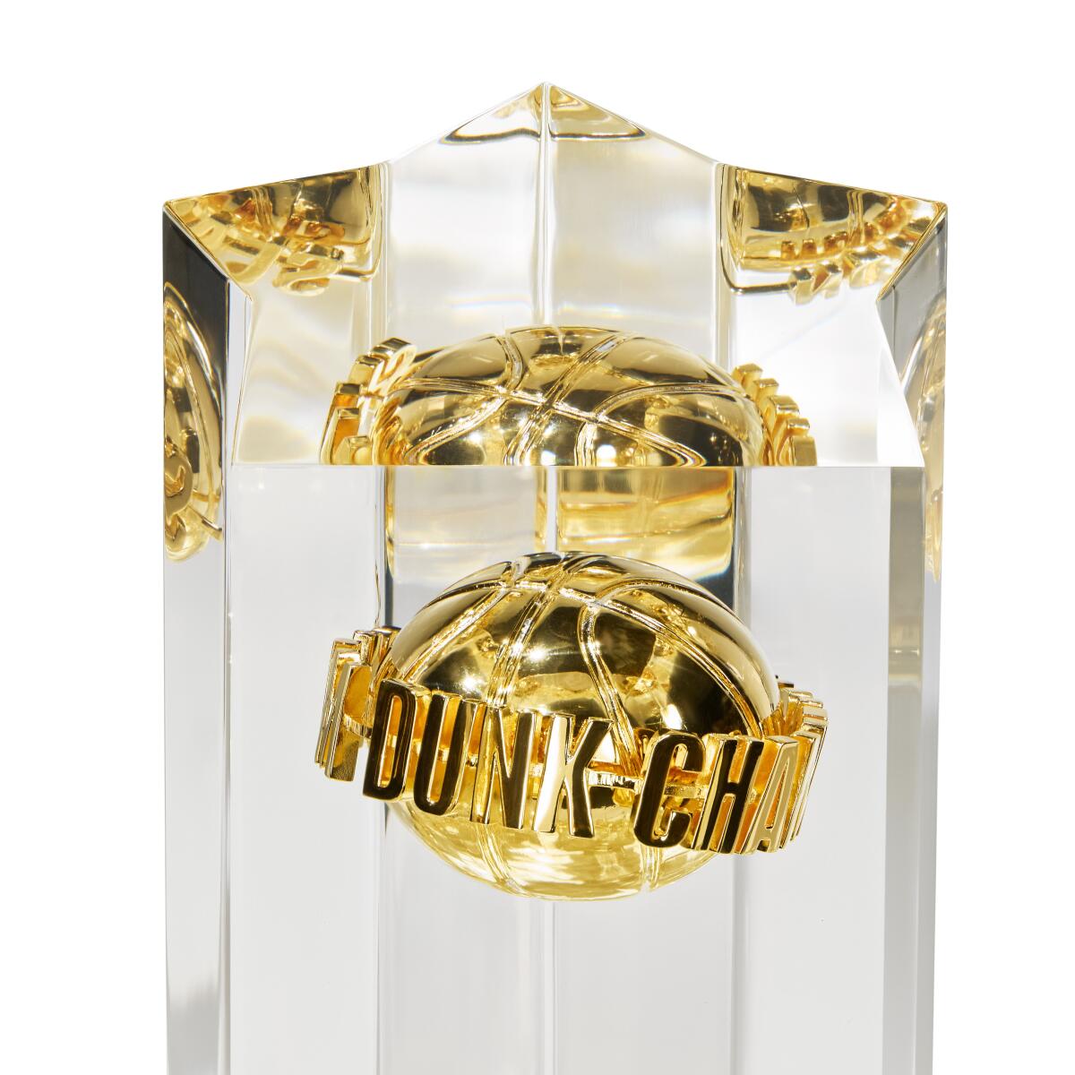 The All-Star slam dunk winner's trophy features a 24-karat basketball embedded in the crystal column.