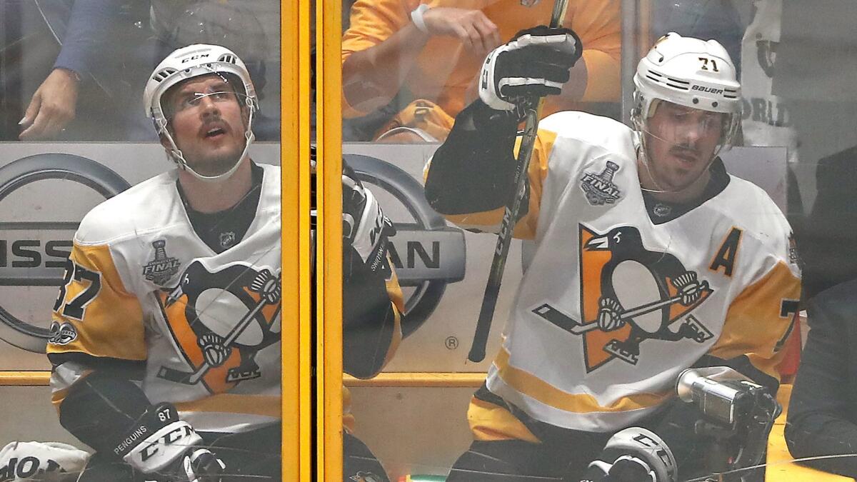 Pittsburgh's Sidney Crosby, left, and Evgeni Malkin were held shotless by the Nashville Predators during Game 3 of the Stanley Cup Finals.