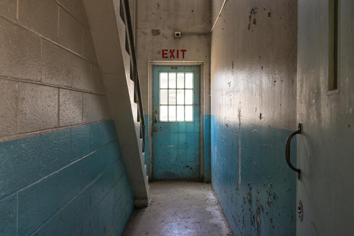 Light peeks through a window inside Youth Training School, a former youth prison in Chino.