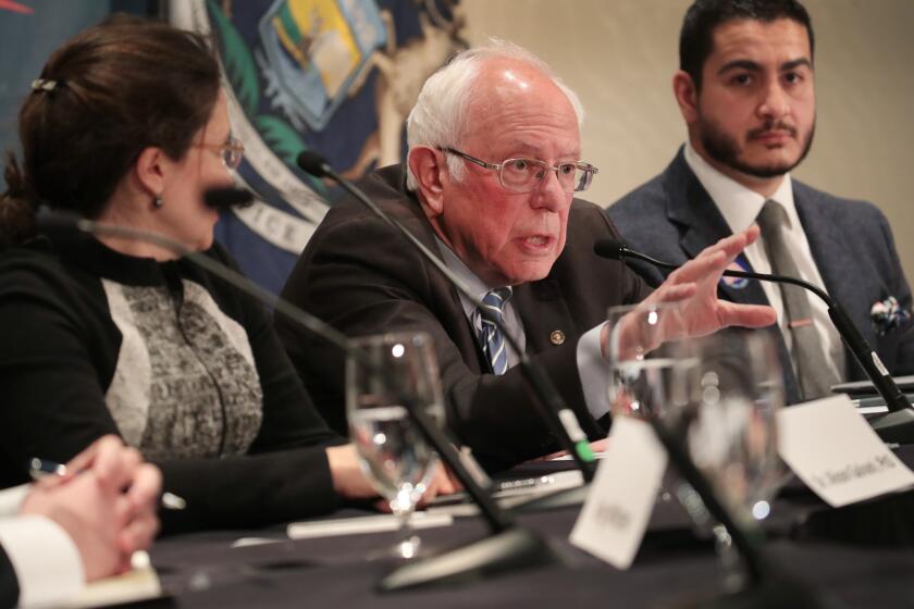 Democratic presidential candidate Sen. Bernie Sanders (I-VT) participates in a coronavirus public health roundtable with healthcare professionals including Dr. Alison Galvani (L) and Dr. Abdul El-Sayed (R)as he continues his campaign swing through the Midwest on March 09, 2020 in Detroit, Michigan. Michigan will hold its primary election tomorrow.