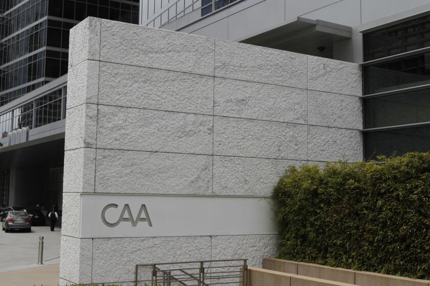LOS ANGELES CA. JUNE11, 2013: The CAA company is located in this building in Los Angeles. The Westfield Century City mall has been inundated with advertisements --several dozen -- that poke fun at talent agency CAA. The ads say "CAANT" and are written in the iconic CAA font and color. On June 11, 2013. (Glenn Koenig / Los Angeles)