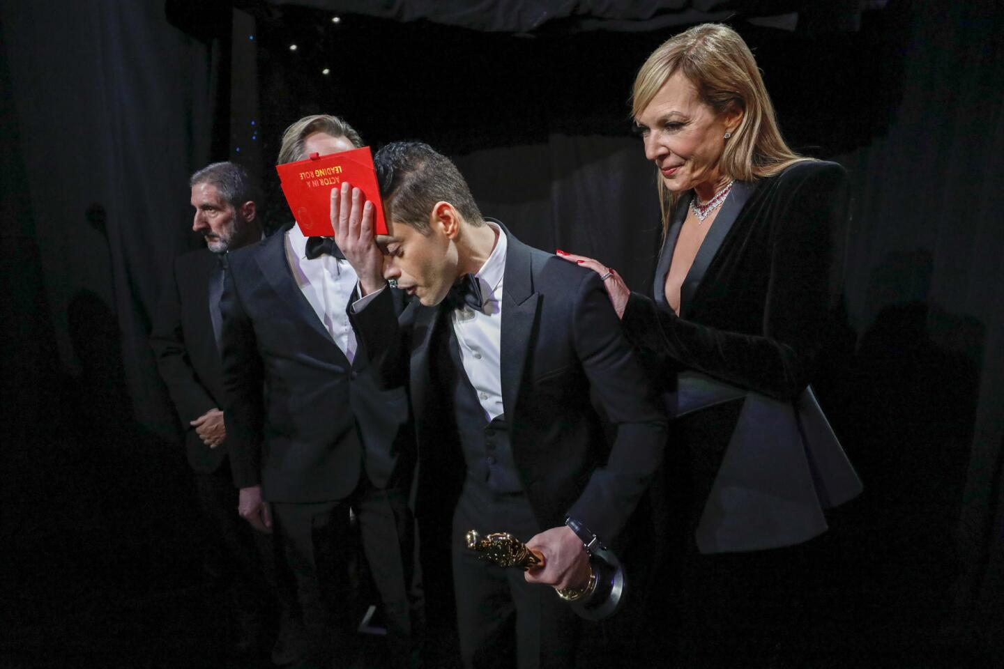 Rami Malek reacts after winning the lead actor award for "Bohemian Rhapsody" backstage at the 91st Academy Awards on Sunday.