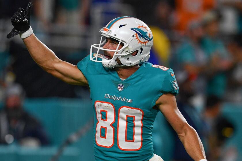 MIAMI, FL - AUGUST 25: Danny Amendola #80 of the Miami Dolphins celebrates a touchdown in the second quarter during a preseason game against the Baltimore Ravens at Hard Rock Stadium on August 25, 2018 in Miami, Florida. (Photo by Mark Brown/Getty Images) ** OUTS - ELSENT, FPG, CM - OUTS * NM, PH, VA if sourced by CT, LA or MoD **