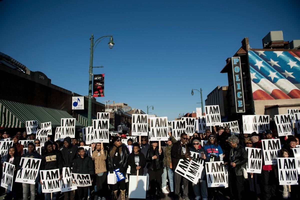 People get ready to march in Memphis, Tenn., in commemoration of the 50th anniversary of the assassination of Martin Luther King Jr.
