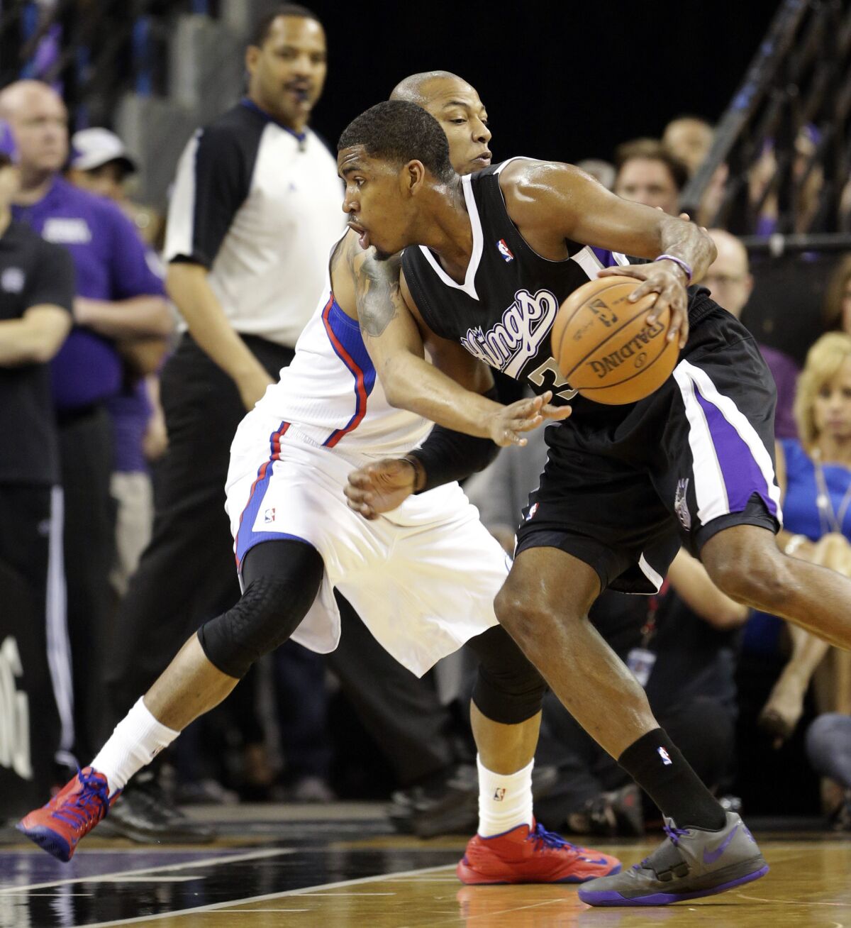 Sacramento Kings forward Jason Thompson, right, drives against Los Angeles Clippers forward Caron Butler during an April NBA game in Sacramento. The city is looking to streamline the environmental review process for a proposed new arena where the Kings would play.