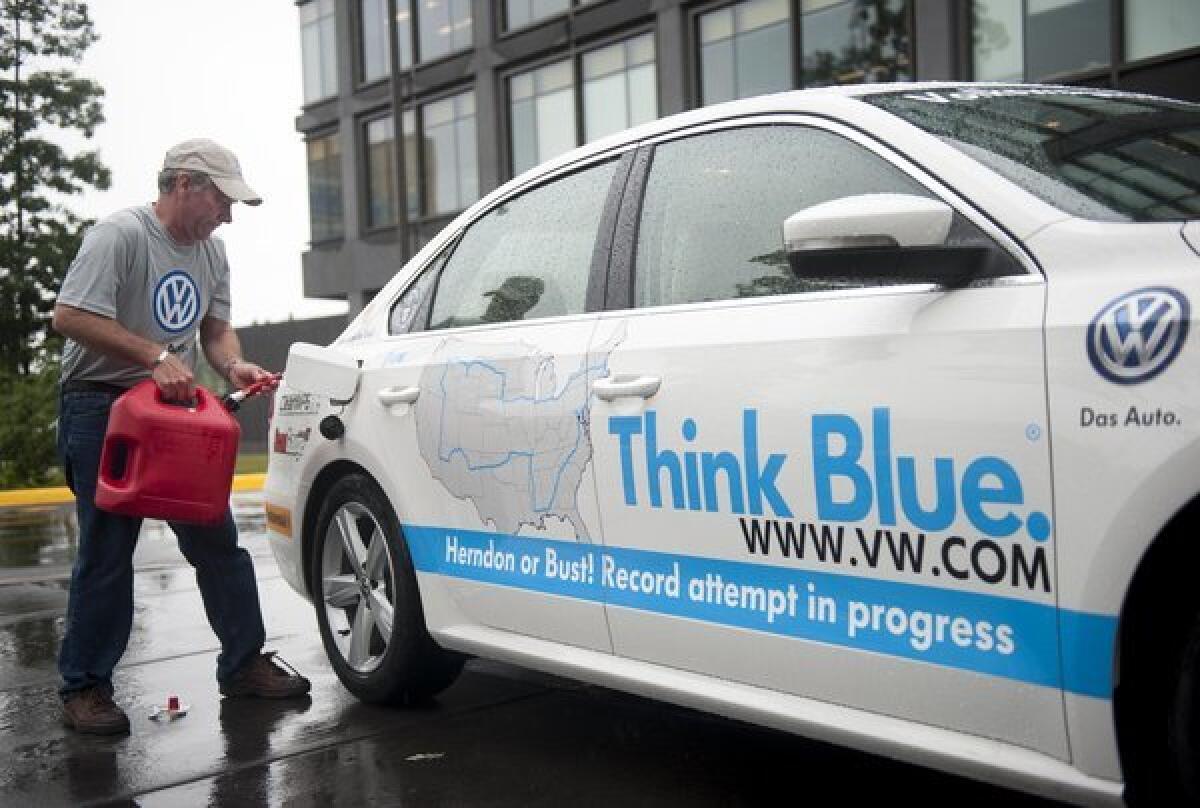 Bob Winger fills the Volkswagen Passat TDI at the headquarters of Volkswagen Group of America in Herndon, Va.