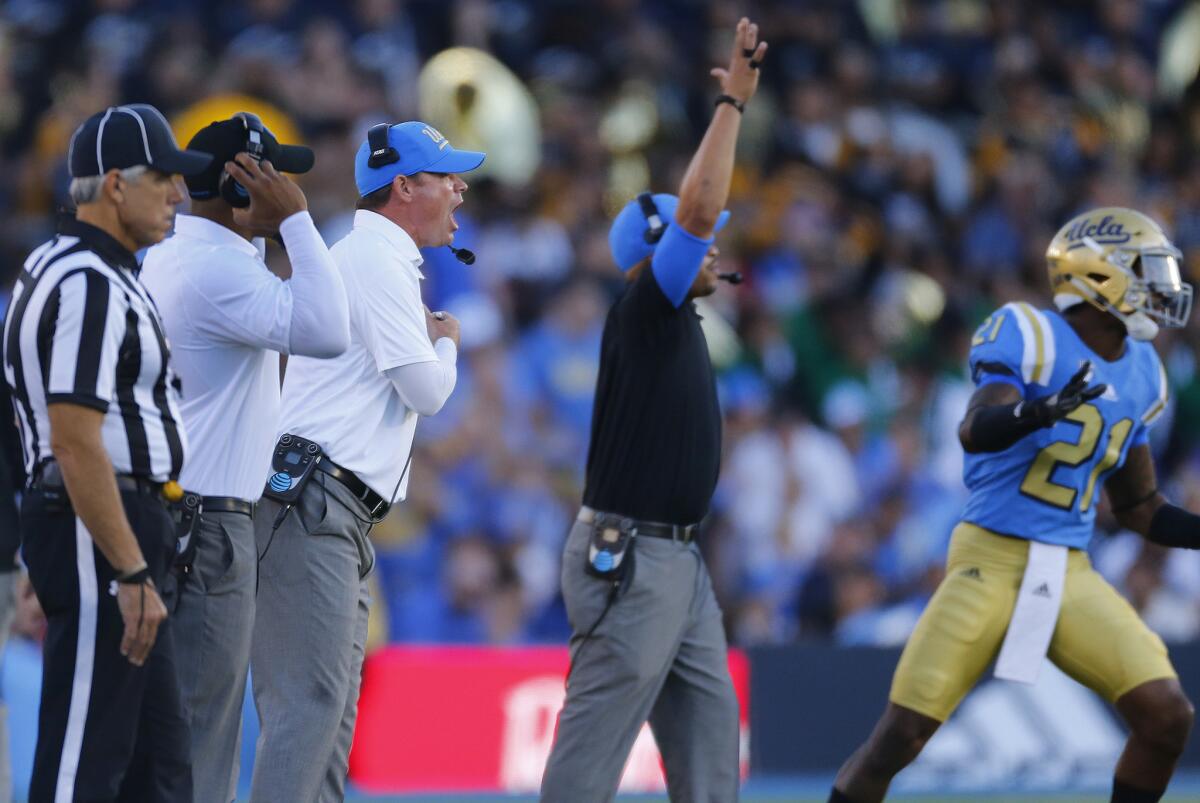 UCLA Coach Jim Mora reacts to a call during a game against Stanford at the Rose Bowl on Saturday.