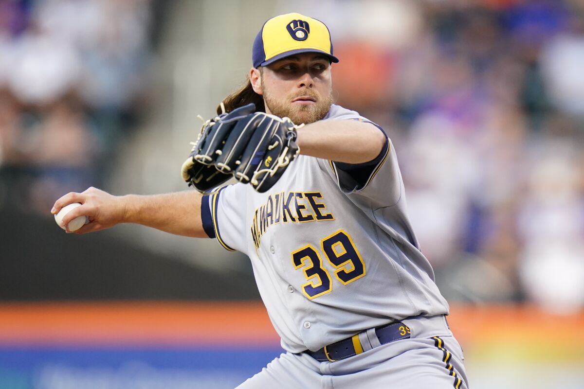 Milwaukee Brewers' Corbin Burnes pitches during the first inning of a baseball game against the New York Mets, Wednesday, June 15, 2022, in New York. (AP Photo/Frank Franklin II)