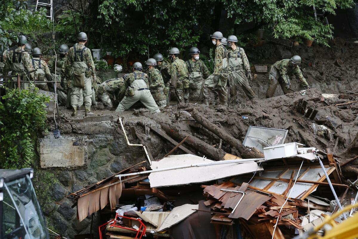 Rescuers at a mudslide