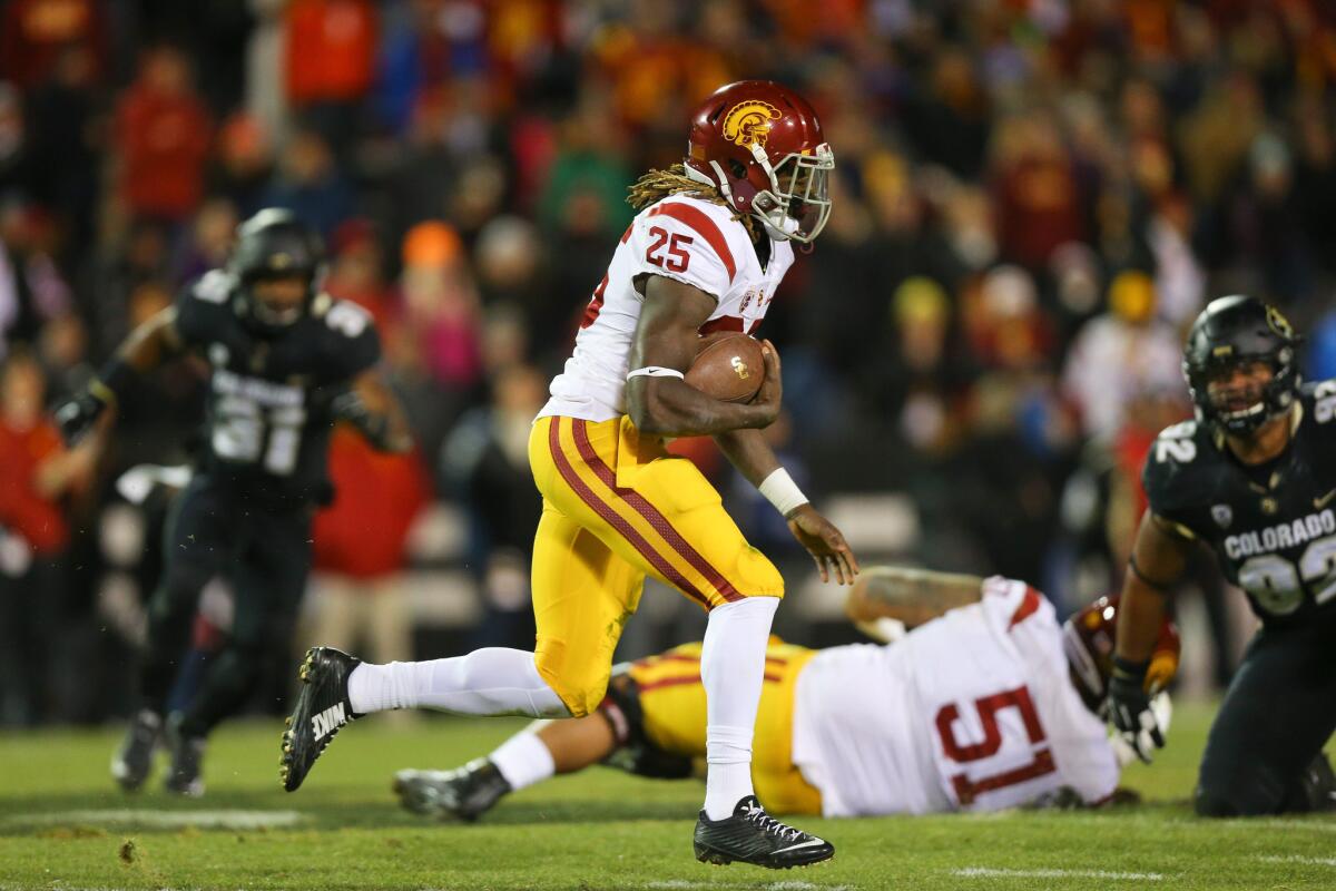 Trojans running back Ronald Jones II picks up yards against the Buffaloes in the first half on Nov. 13.
