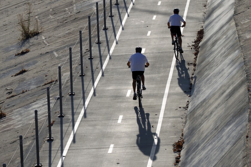 Councilman Jose Huizar pushed for Los Angeles to explore filling in an eight-mile gap in the L.A. River bike path.
