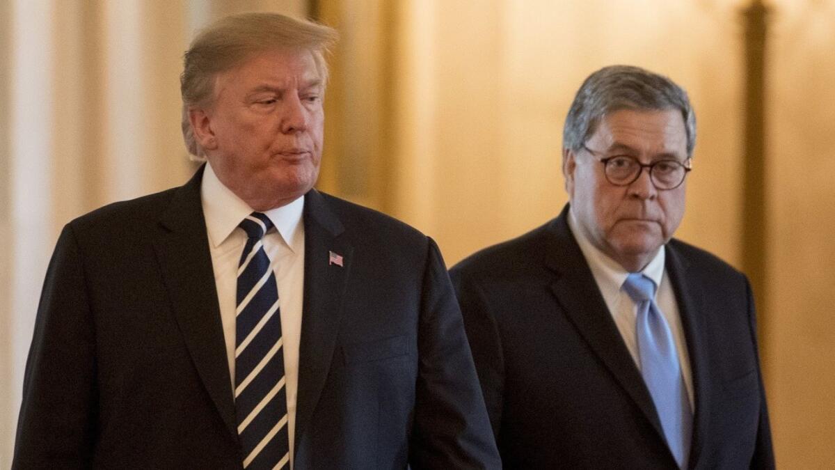 President Trump and Atty. Gen. William Barr, right, at the White House on May 22, 2019. 