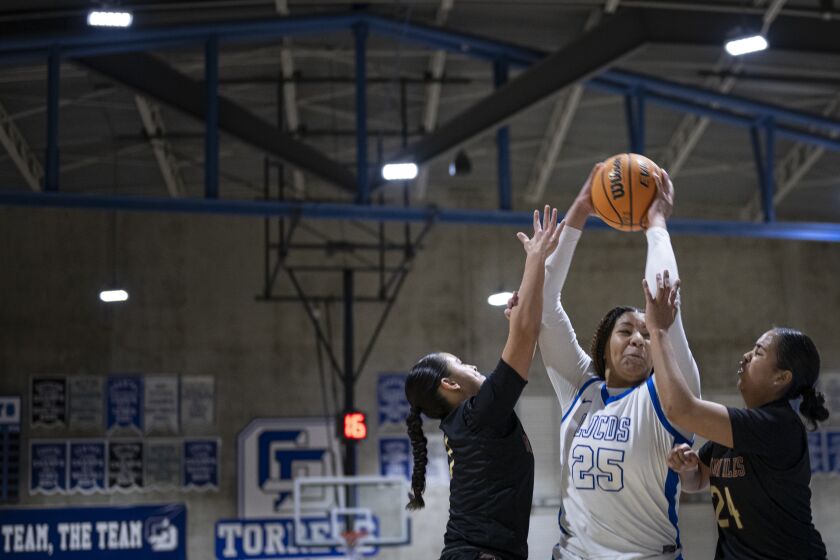 La Jolla, CA - February 22: La Jolla Country Day senior Breya Cunningham drives the ball as La Jolla Country Day hosts Mission Hills on Feb. 22, 2023, in the Girl's Basketball CIF Open Division semifinals.