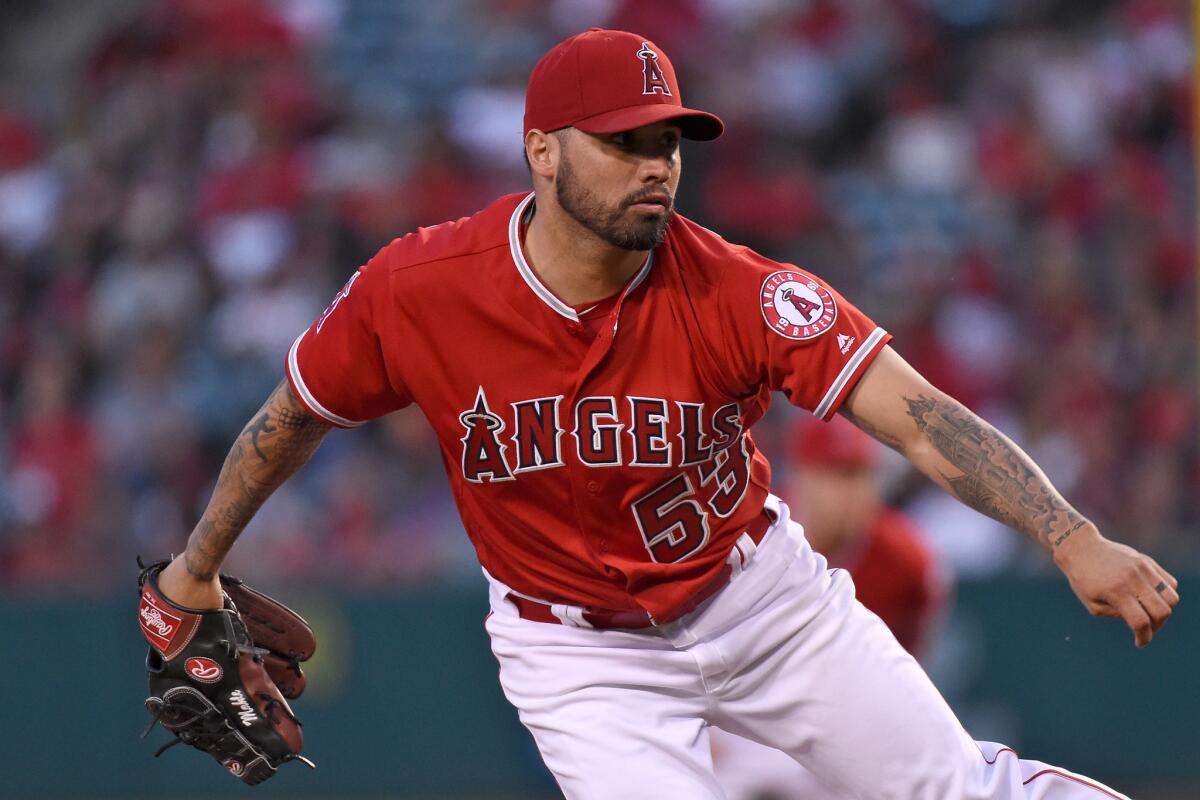 Angels starter Hector Santiago was ejected from Friday night's game in the third inning.