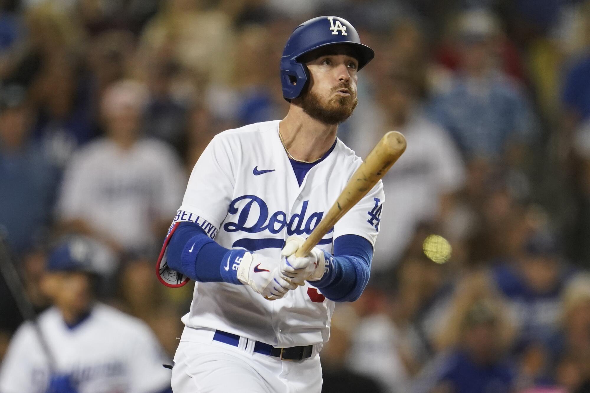 Cody Bellinger breaks a 1-1 tie on an eighth-inning grand slam against the San Francisco Giants at Dodger Stadium.