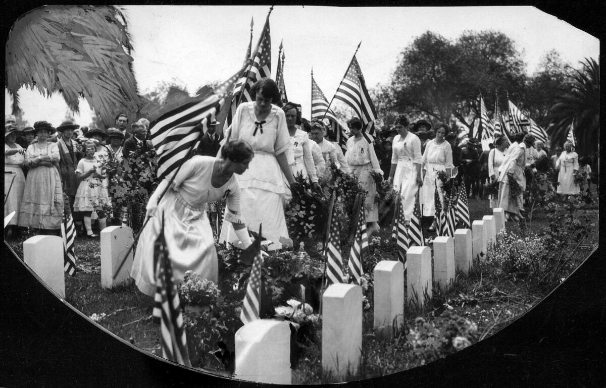 May 30, 1922: Graves at Rosedale Cemetery are decorated during Memorial Day.