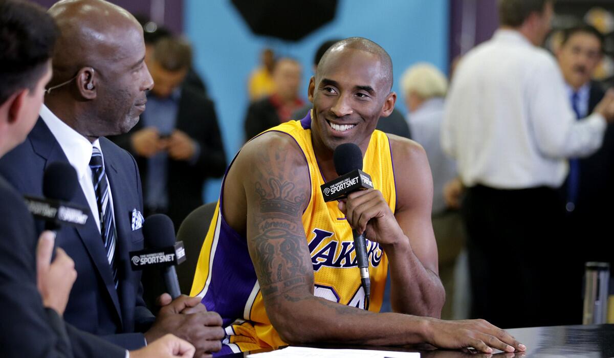 Lakers guard Kobe Bryant is shown being interviewed by James Worthy on Sept. 29.