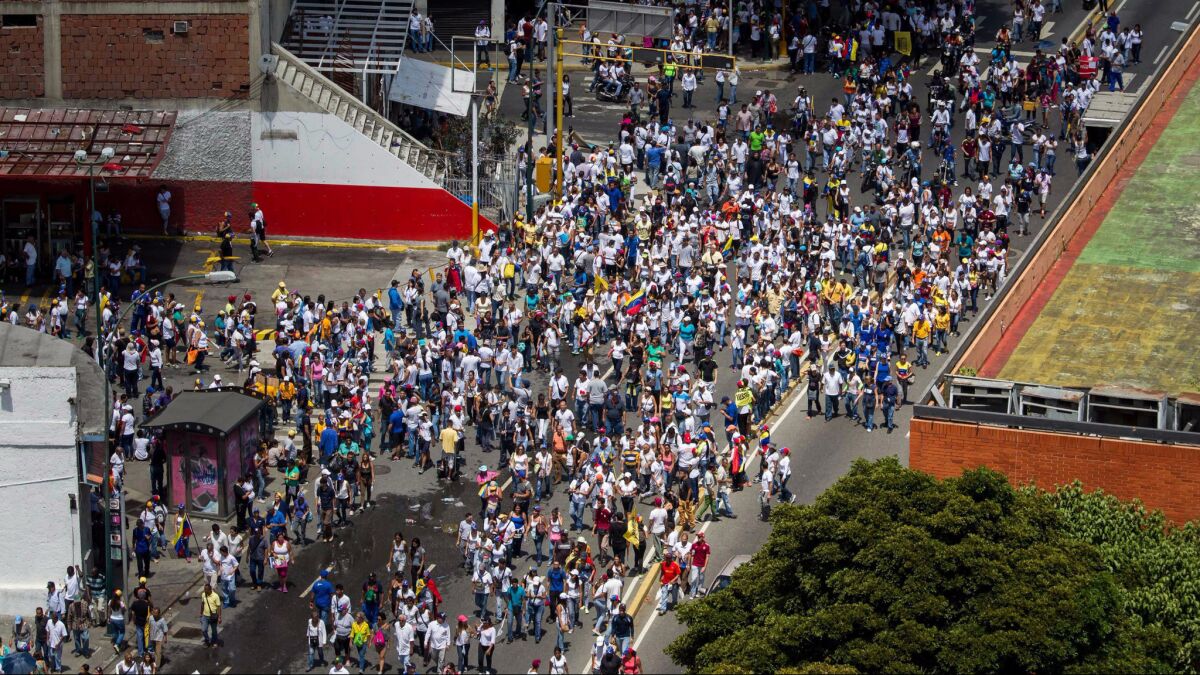 Thousands protest in Caracas, Venezuela.