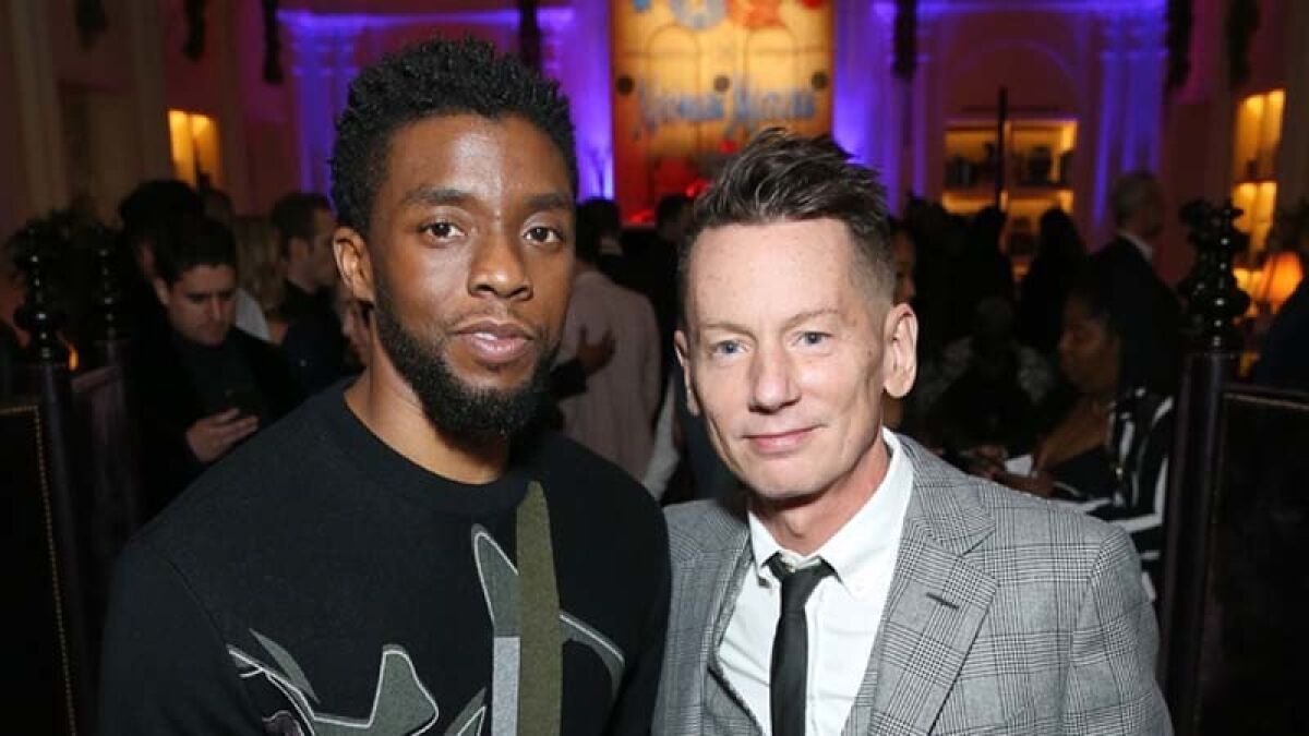 "Black Panther" star Chadwick Boseman, left, and GQ editor in chief Jim Nelson at the magazine's NBA All-Star Game party in downtown L.A. on Saturday night.