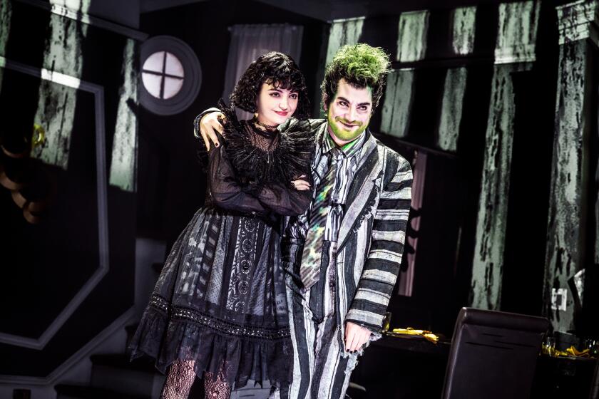 Stars of "Beetlejuice," from left to right, Isabella Esler as Lydia and Justin Collette as Beetlejuice.