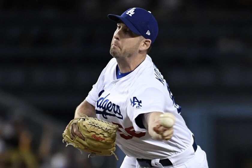 LOS ANGELES, CA - SEPTEMBER 04: Relief pitcher Adam Kolarek #56 of the Los Angeles Dodgers throws against the Colorado Rockies during the fifth inning at Dodger Stadium on September 4, 2019 in Los Angeles, California. (Photo by Kevork Djansezian/Getty Images)
