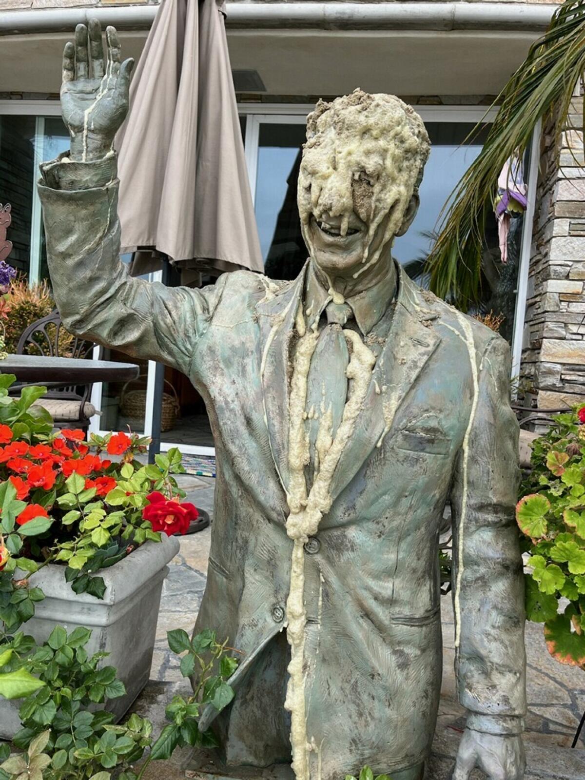 The vandalized sculpture of Ronald Reagan at Miriam Baker’s home.
