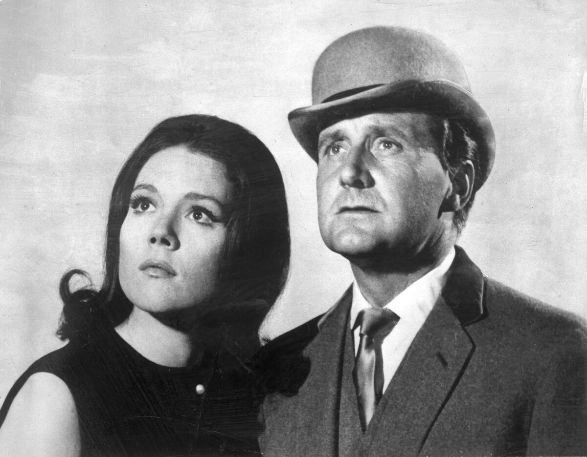 Patrick Macnee as John Steed was memorably paired with Diana Rigg as Mrs. Emma Peel in the 1960s TV series "The Avengers."