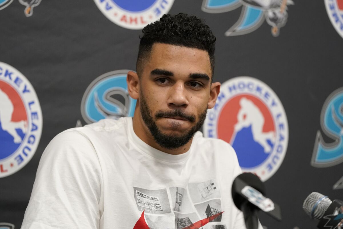 FILE - Evander Kane speaks at a news conference after a hockey practice in San Jose, Calif., on Nov. 30, 2021. The Sharks have placed Kane on unconditional waivers on Saturday, Jan. 8, 2022, with the intent to terminate the remainder of his $49 million, seven-year contract. (AP Photo/Jeff Chiu, File)