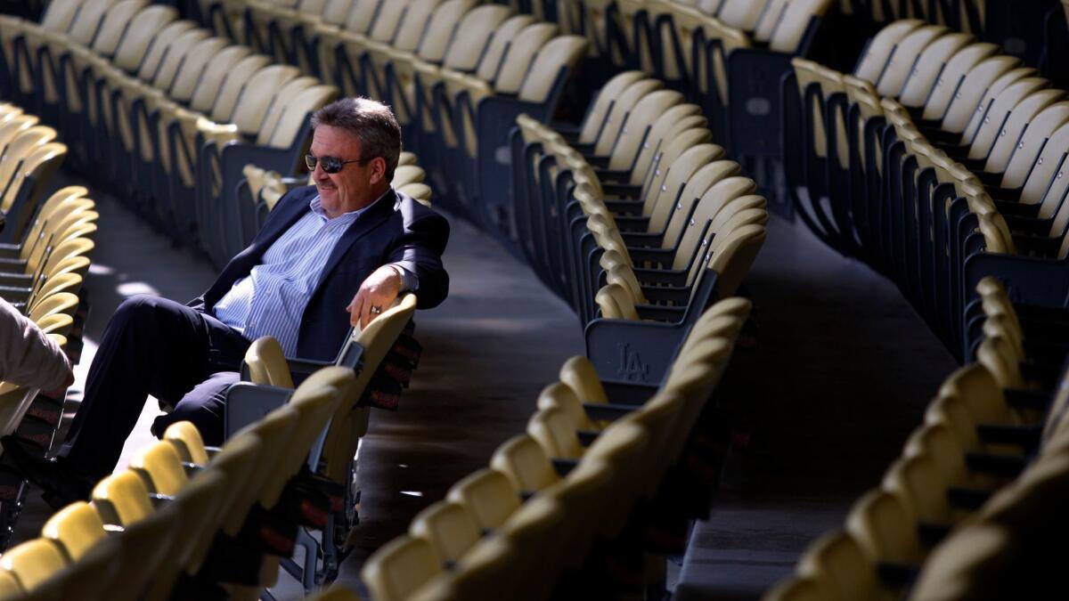 It can be tough at the top. Ned Colletti refects on his nine years as the Dodgers' general manager in his new memoir.