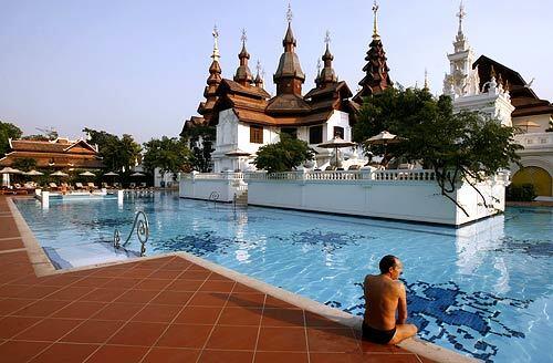 Poolside at the 60-acre Mandarin Oriental Dhara Devi Hotel in Chiang Mai, Thailand