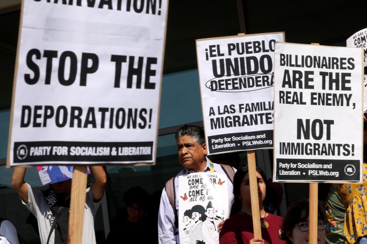 Immigration rights activists gather and protest.