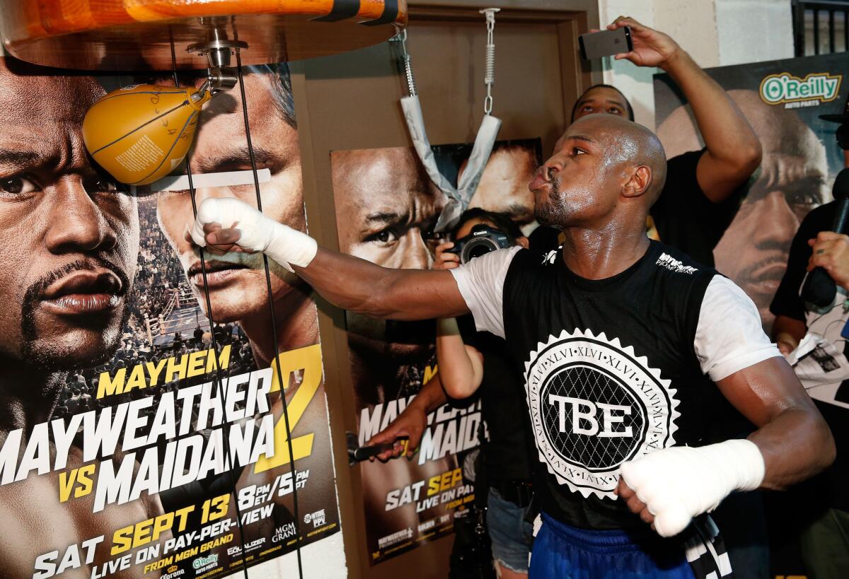 Boxer Floyd Mayweather fights Marcos Maidana on Sept. 13.