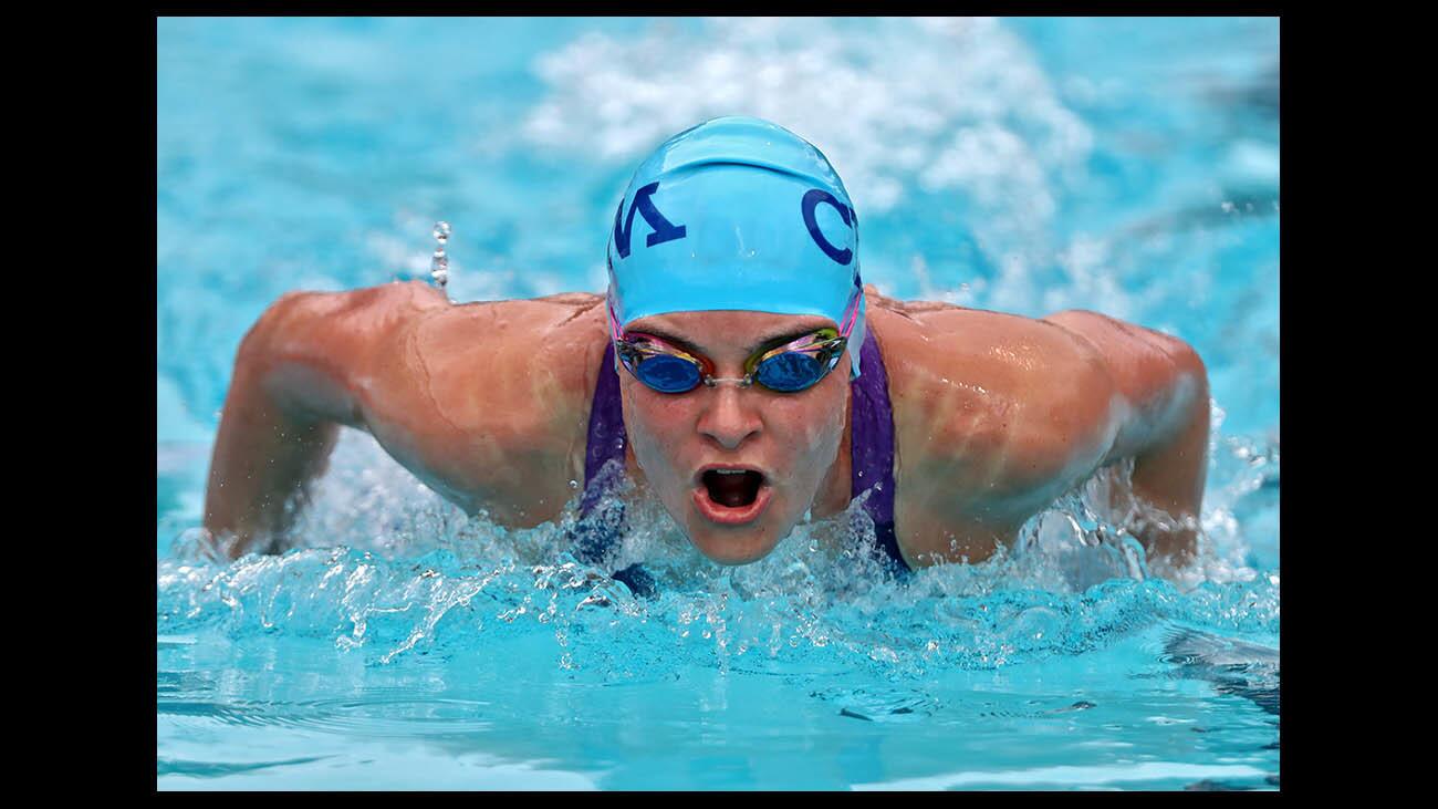 Corona Del Mar swimmer Karsyn Cook does the butterfly part of the varsity girls 200 yard medley relay art the 2018 CIF SS Division 1 Swimming and Diving Championships at Riverside City College Aquatics Center in Riverside on Saturday, May 12, 2018.