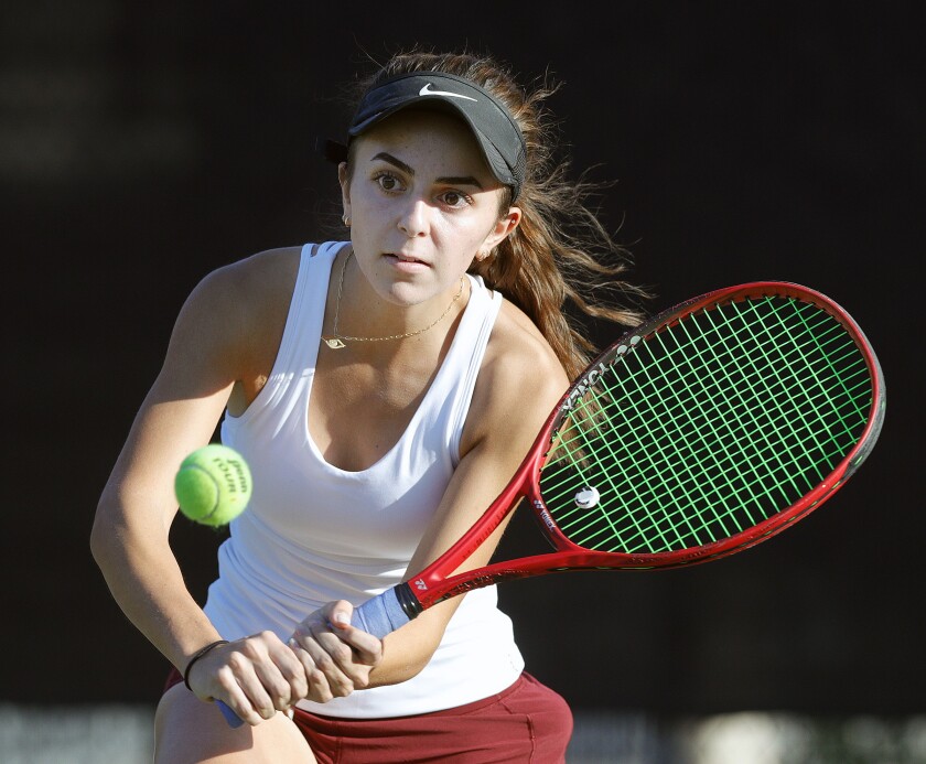 La Cañada High singles player Annabelle Kevakian hits a backhand return in a Rio Hondo League match against South Pasadena on Monday.