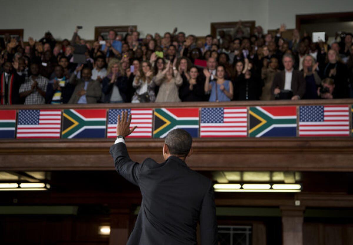 President Obama speaks at the University of Cape Town on Sunday in the culmination of his visit to South Africa. In his speech he lauded former South African president and anti-apartheid hero Nelson Mandela, who lies gravely ill in a Pretoria hospital.