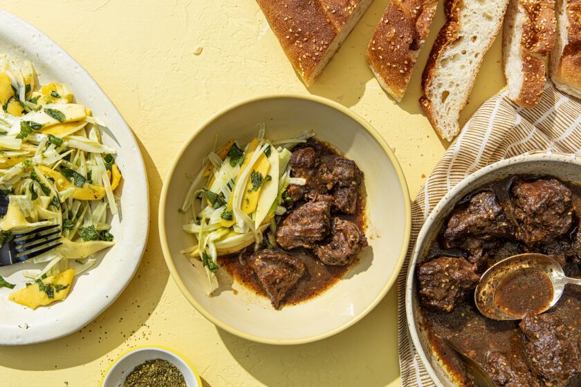 LOS ANGELES, CALIFORNIA, Aug. 25, 2021: Za'atar Beef Cheeks with Fennel and Mango Salad for the september Week of Meals collumn by Ben Mims, photographed on Wednesday, Aug. 25, 2021, at Proplink Studios in Arts District Los Angeles. (Photo and Prop Styling / Silvia Razgova / For the Times) ATTN: 829341-la-fo-week-of-meals-september-2021