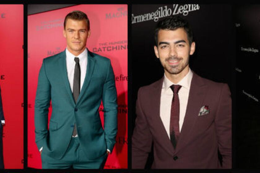 On the red carpet, from left, Liam Hemsworth in Dior Homme, Alan Ritchson in Versace and Joe Jonas and Gerard Butler in Z Zegna.