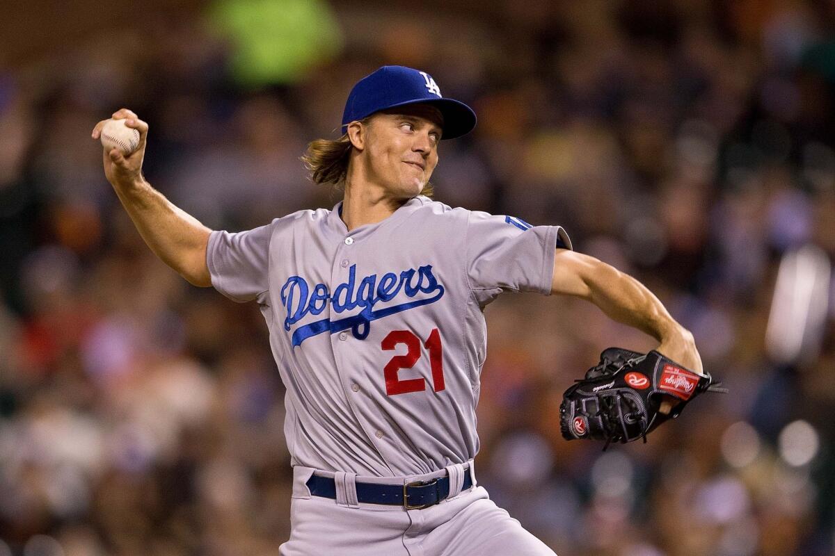 Dodgers' Zack Greinke pitches against San Francisco on Monday night.